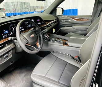 Cadillac luxury suv rental front seat