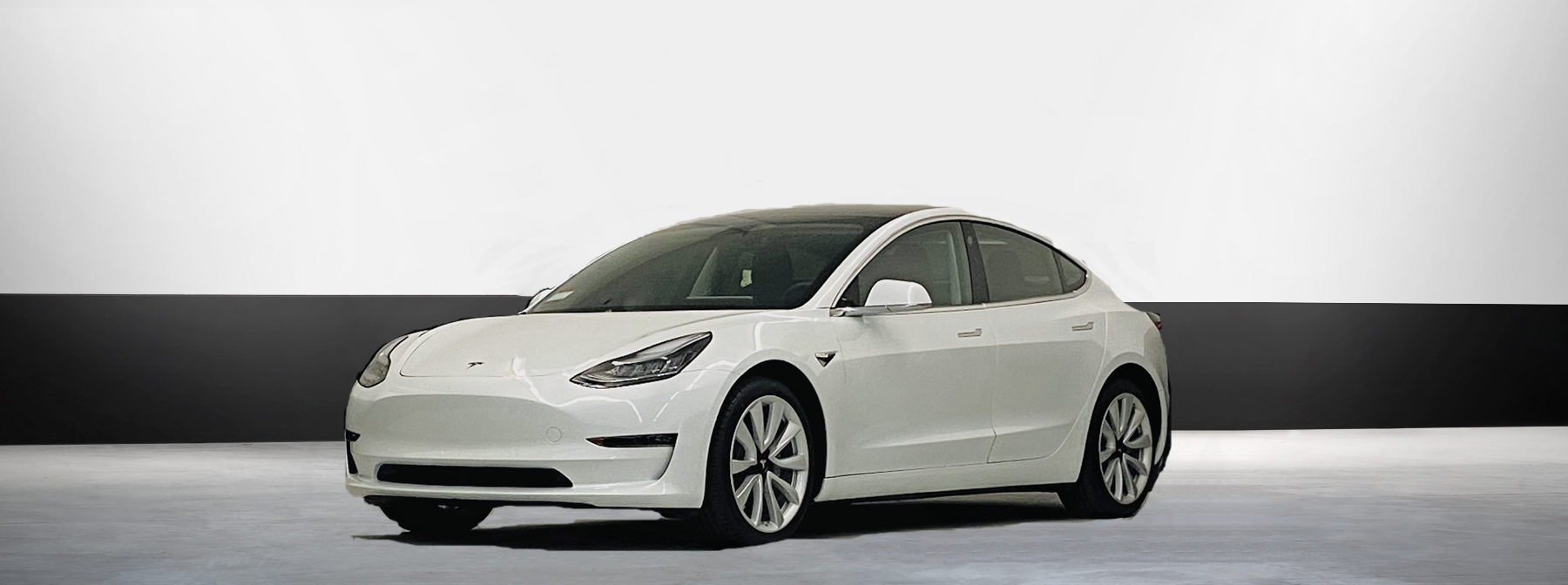 Tesla rental model 3 white exterior electric car rental