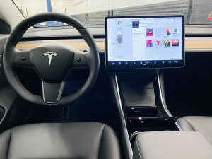 Tesla electric car rental wheel and dash